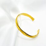 HANDCUFF BRACELET GOLD